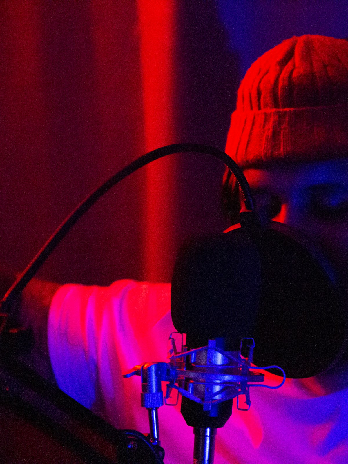 Musician wearing headphones in a studio