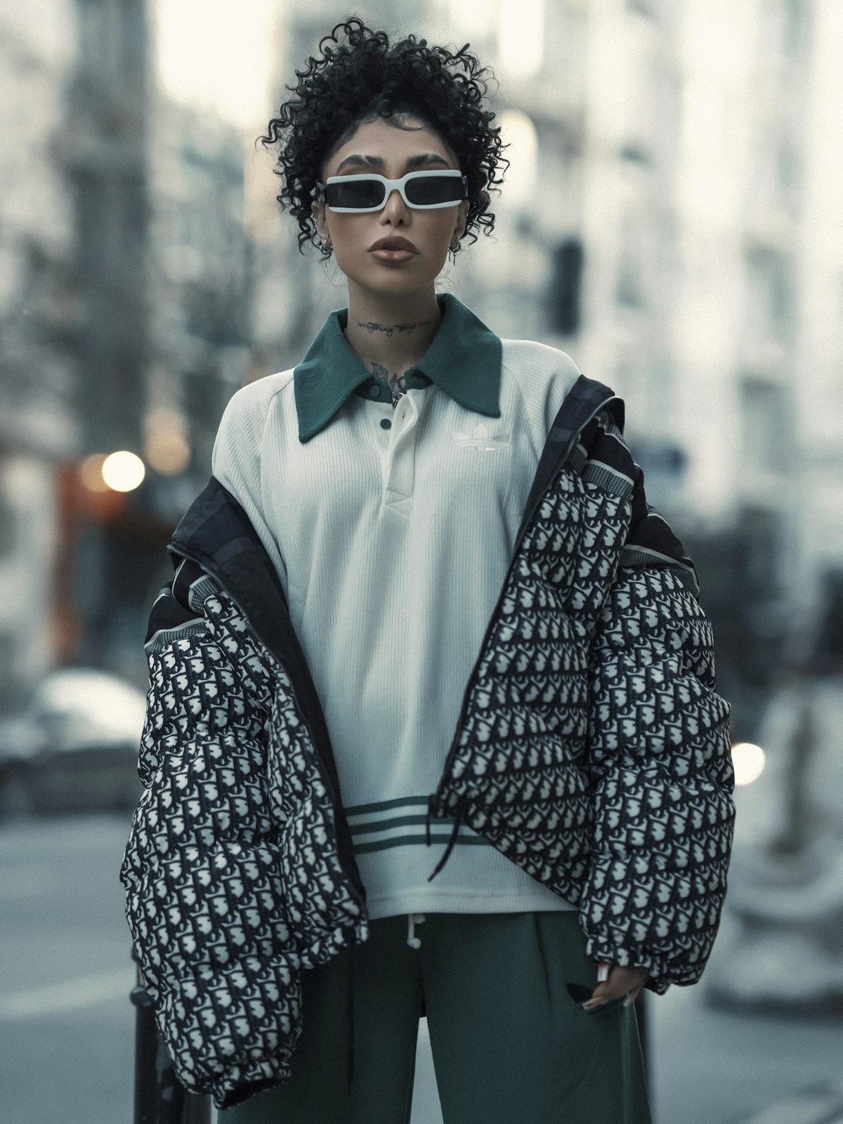White shirt and green trousers, photographed on the street